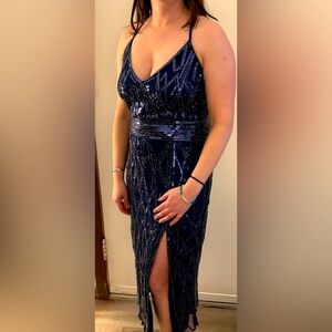 Sparkly fun wedding guest dress, navy blue with silver detailing in the beading.